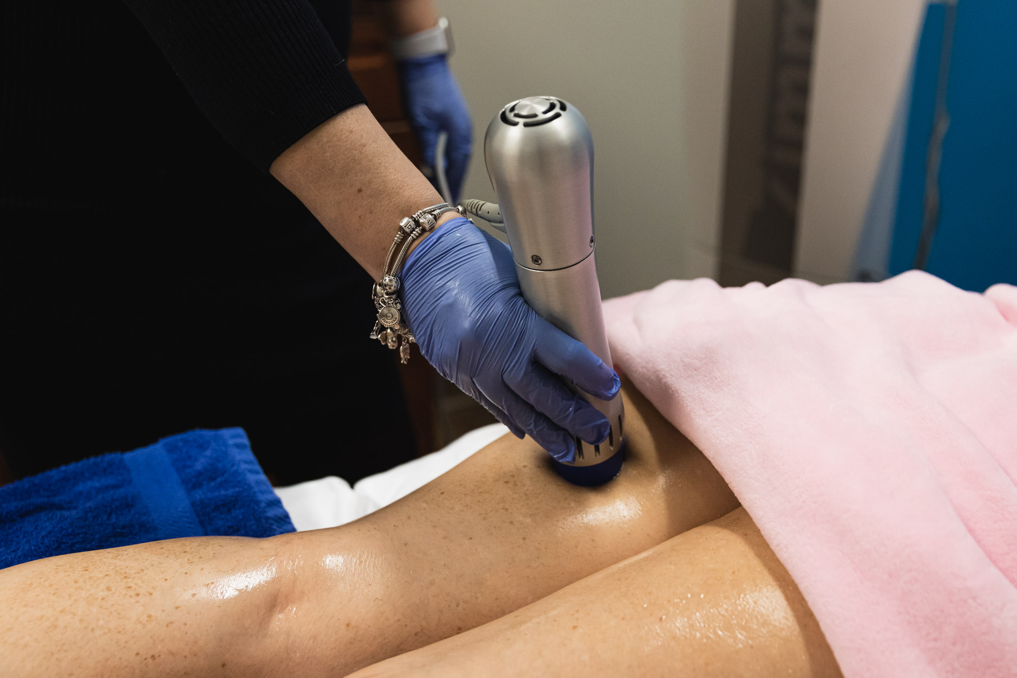 Anti-cellulite treatment at medical spa center, vacuum massage procedure  Stock Photo by leszekglasner